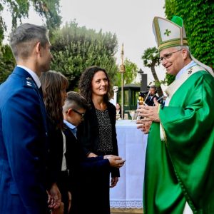Pope Leo XIV greeting a Vatican gendarme's family in a morning briefing story on service and faith - Photo: @pontifex